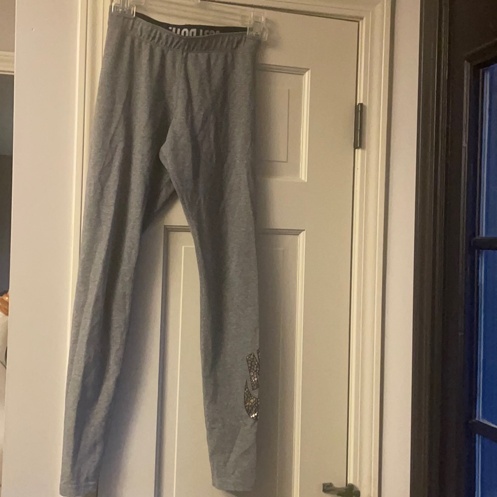 Nike grey pants with Nike logo dotted rose gold